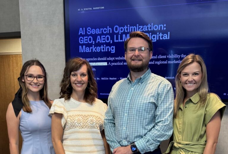 Dr. Kollin Napier with the Intrinsic Media team after an AI search optimization session on the Mississippi Gulf Coast.