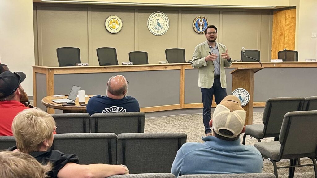 Dr. Kollin Napier speaks with business, civic, and community leaders at the Gautier Area Council on July 28, 2026.