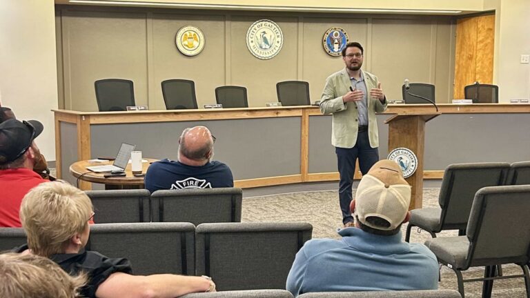Dr. Kollin Napier speaks with business, civic, and community leaders at the Gautier Area Council on July 28, 2026.