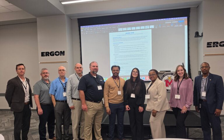 A student project team and partners at the 2026 Mississippi AI Innovation Hub Showcase in Jackson.