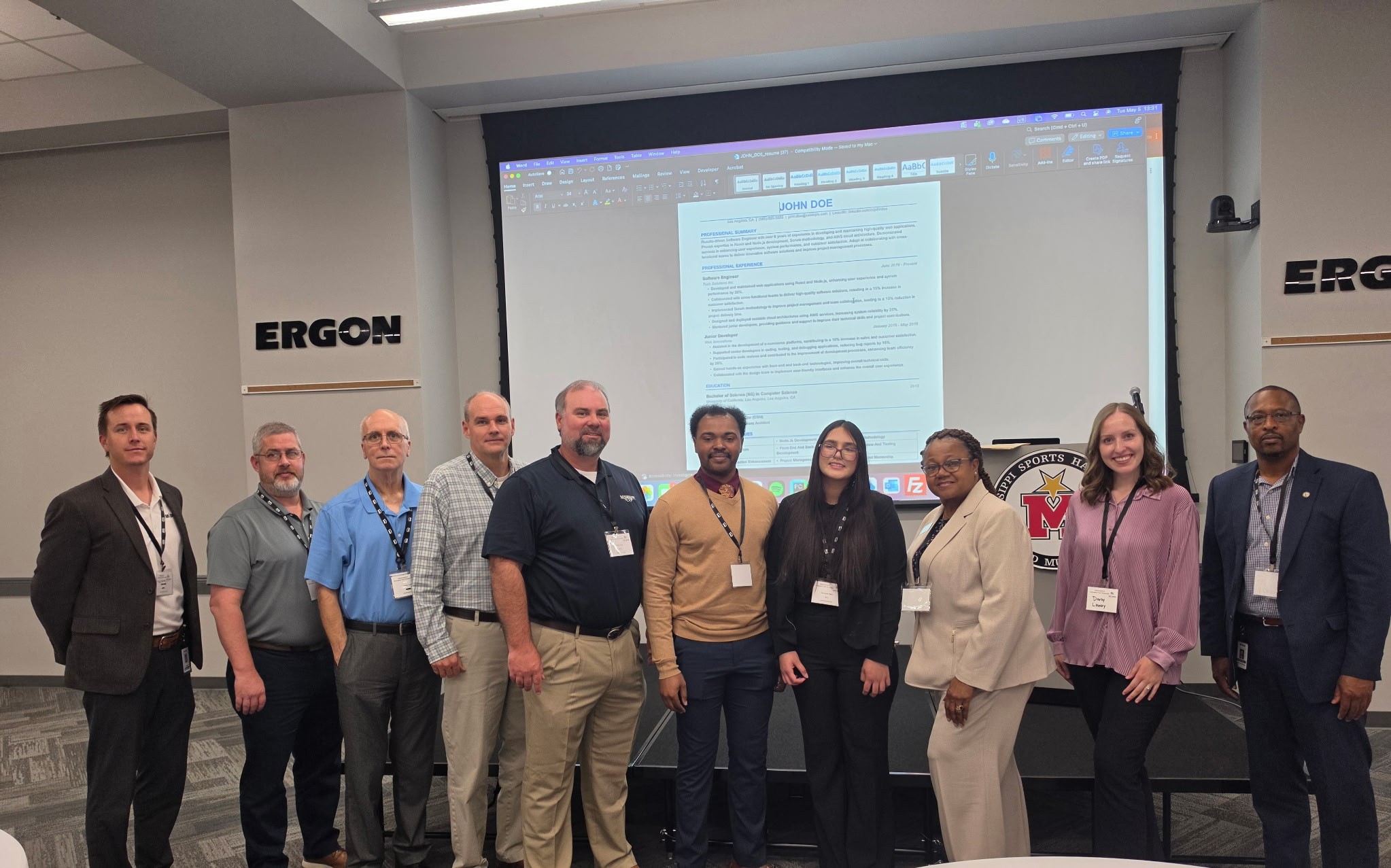 A student project team and partners at the 2026 Mississippi AI Innovation Hub Showcase in Jackson.