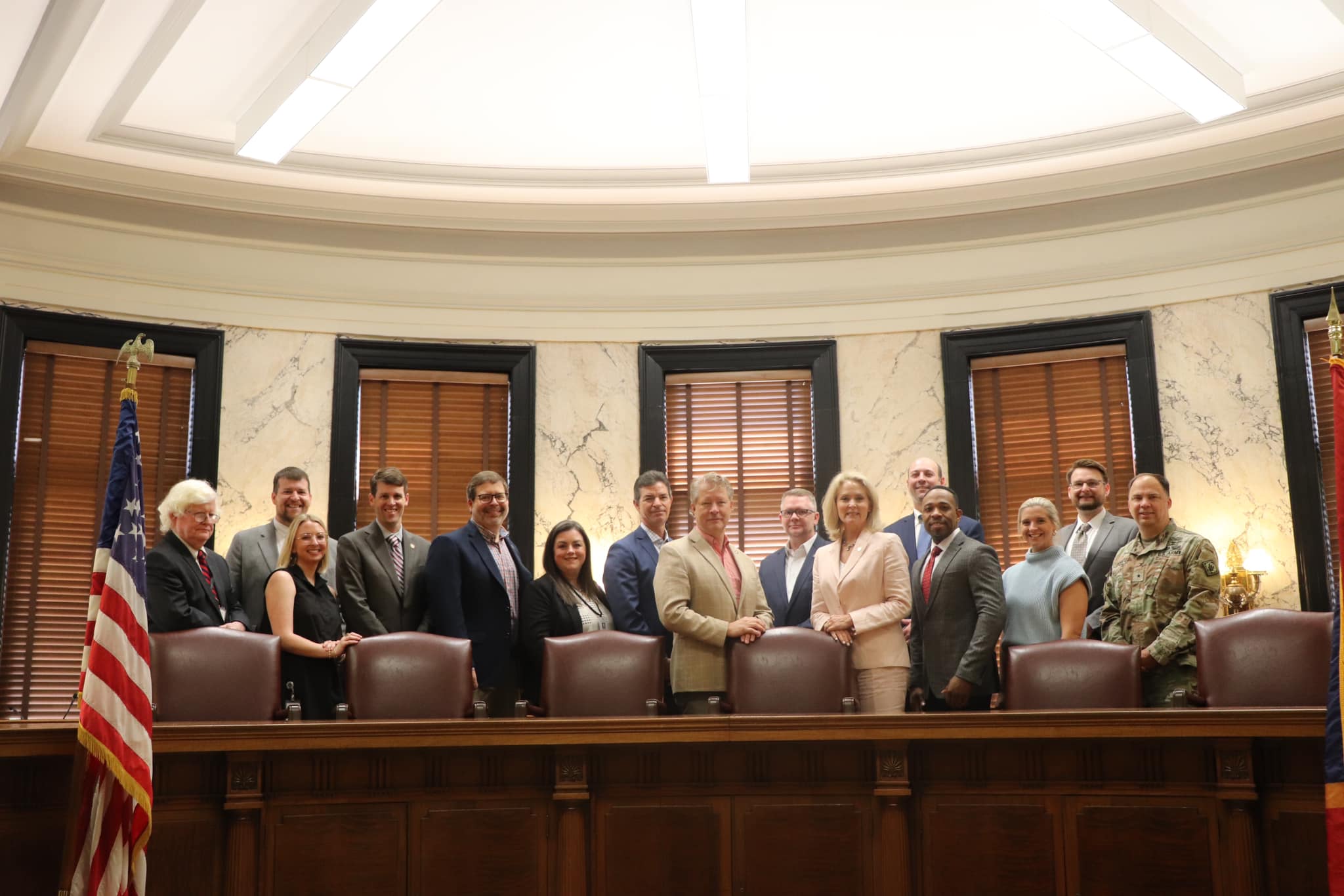 Members of the Mississippi Artificial Intelligence Regulation Task Force gather at the Mississippi Capitol on April 17, 2025
