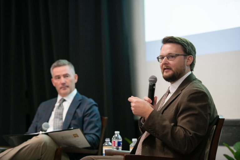 Dr. Kollin Napier speaks with Gulf Coast Business Council President and CEO Jamie Miller at the September 2026 meeting.