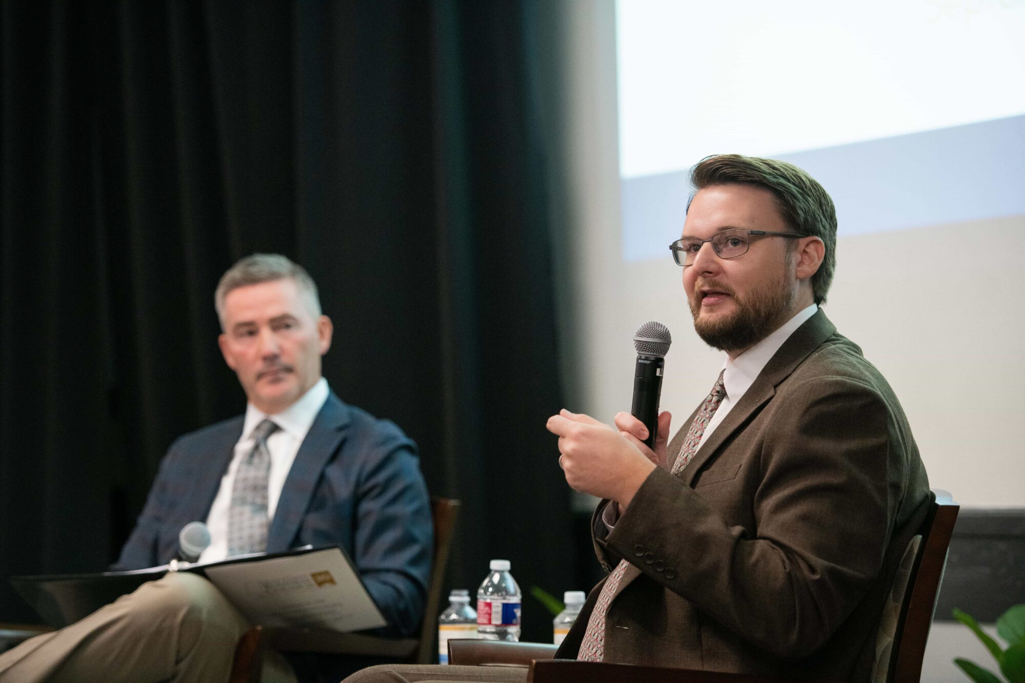 Dr. Kollin Napier speaks with Gulf Coast Business Council President and CEO Jamie Miller at the September 2026 meeting.